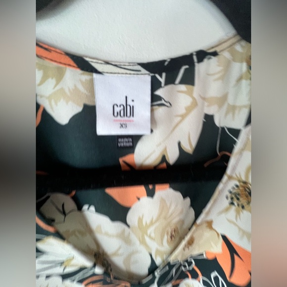 CAbi 4043 Enchant Blouse Xs Black Floral Striped smocked sleeve Vneck
1120 - Picture 3 of 5